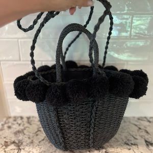 Black Straw Pocketbook with Pom Poms